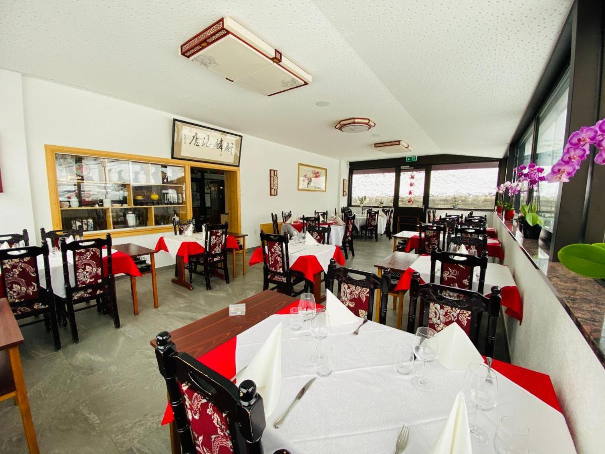 Qi-Lin Hotel Restaurant Ayer 外观 照片